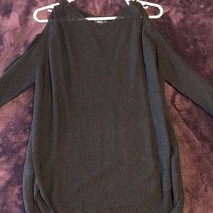 Black sweater with cutout details on the arms